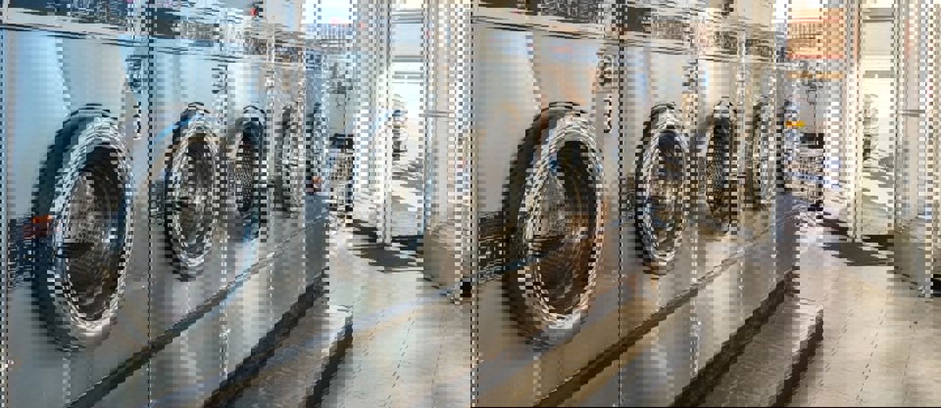 Commercial Laundry Row Of Washing Machines Min